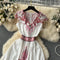 Elegant Lapeled Sleeveless Floral Dress