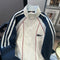 Color-blocking Striped Baseball Jacket