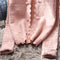Solid Color Pearl Button Low-neck Cardigan