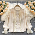 Double-breasted Ruffled Puff Sleeve Top