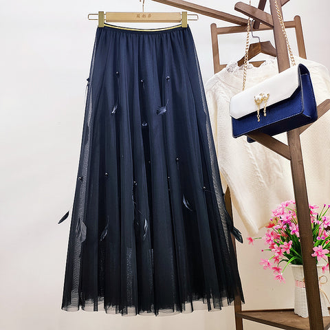 Pleated Skirt And Feather Mesh Skirt